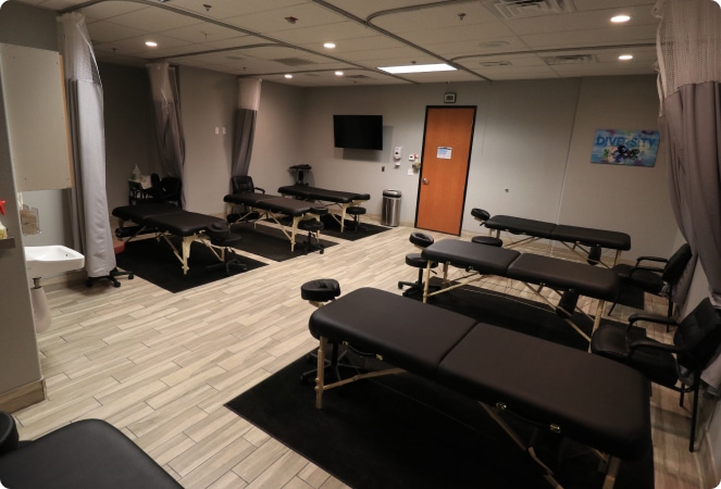 massage school classroom with massage tables